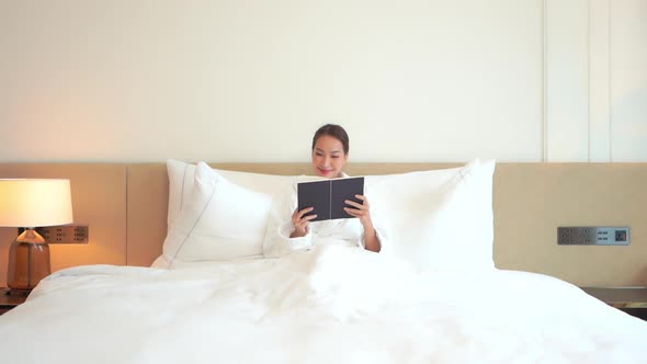 Young asian woman read book