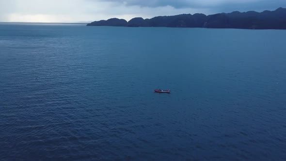 4k 24fps Drone Shoot Of A Boat In The Middle Of The Ocean With fisherman