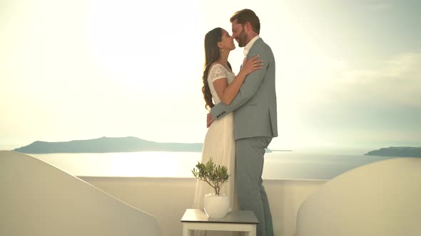 Wedding Couple Kissing Terrace Sunset