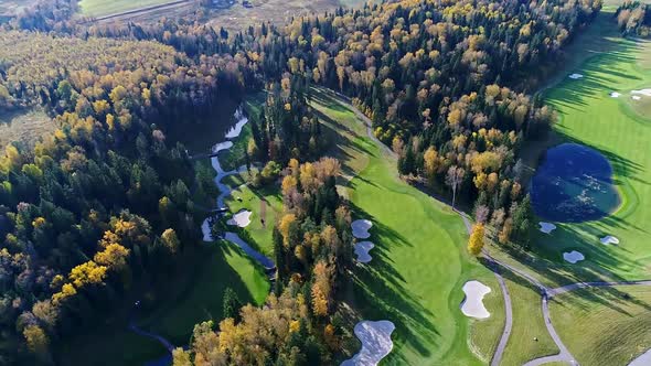 Aerial View of Golf Course Near the Forest