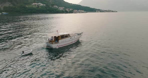 people enjoying their leisure on boat in bay