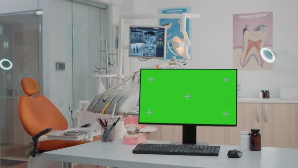 Nobody in Stomatology Office with Green Screen on Computer