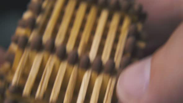 Person Turns Toy House Made From Matches Extreme Close View