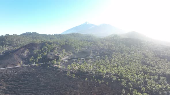 Drone Aerial of the Peak of a Volcanic Mountain in a National Nature Park Rocky Rough Beautiful