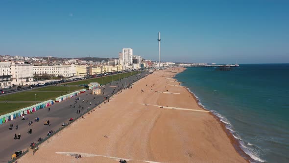 Drone shot of Brighton beach and cityscape in East Sussex, England, UK