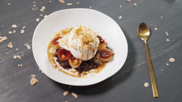 Young Beautiful Woman Eating a Dessert in Modern Restaurant High Kitchen Ice Cream Famous Chef