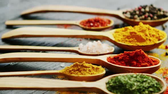 Spoons with Assorted Spices on a Table