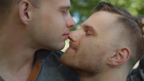 Portrait of Gay Couple Expressing Feelings Outdoor