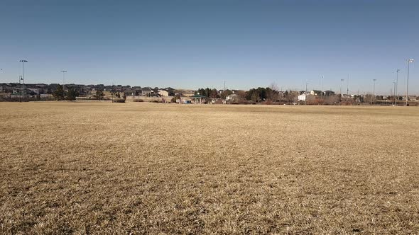 Aerial view of residential neighborhood in suburbia in snowless Winter