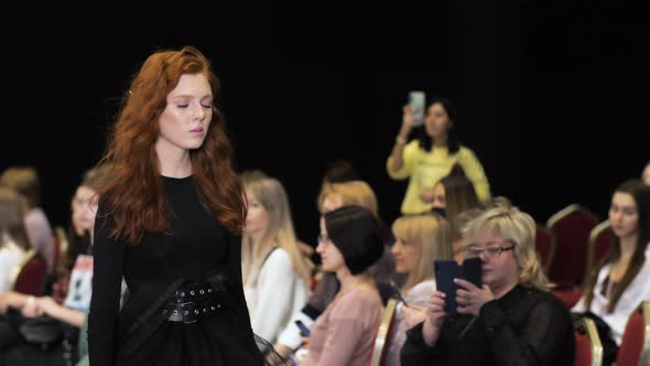 Ginger Model Walking on Defile Podium