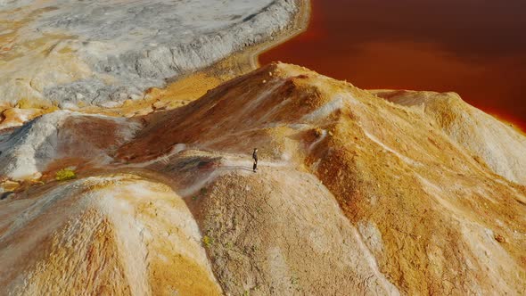 Ural Mars A man is standing on a clay mountain Mars planet