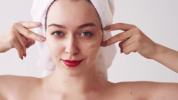 Makeup Foundation Woman Applying Beige Face Cream