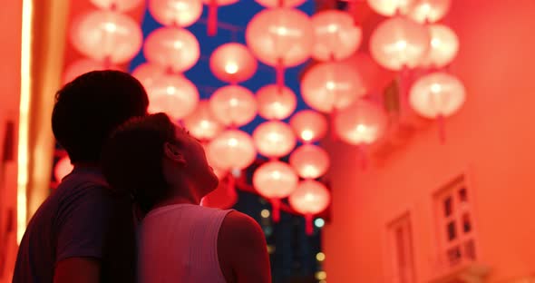 Chinese Couple Look at The Red Lantern Together