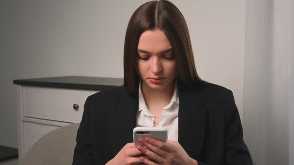 Portrait of Attractive Young Woman Using Phone for Online Shopping in Social Media Woman Typing