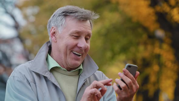 Joyful Elderly Man Making Video Call Use Modern Smartphone Mature Smiling Grandpa Holding Mobile