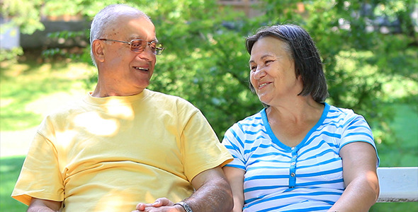 Senior Couple Relaxing Together in City Park