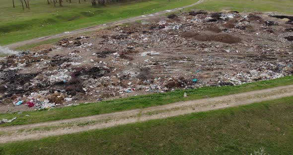 Meadows Revealed Large Garbage Landfill At Forest Countryside. - Aerial Drone Shot