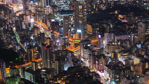 time lapse of the Metropolitan Expressway junction road and city at night, Tokyo, Japan