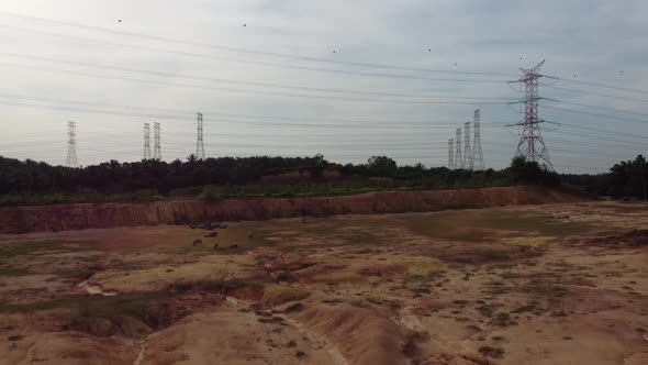 Electric tower near land clearing