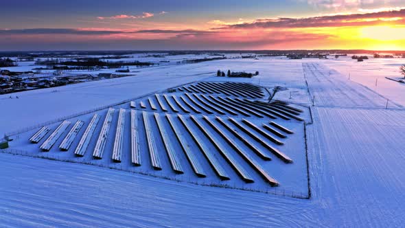 Alternative energy. Frozen photovoltaic farm in winter.