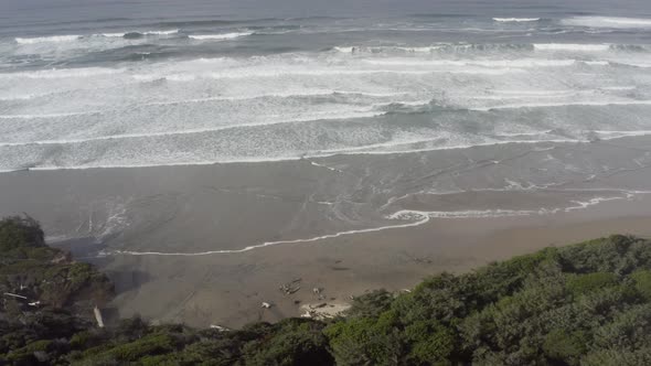 big waves in rough sea on wild tropical beach. seascape, coastline, aerial view