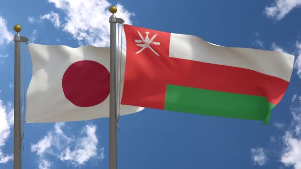 Japan Flag Vs Oman Flag On Flagpole