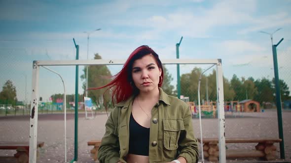 Portrait of a girl on the playground, street modern dance on the playground.