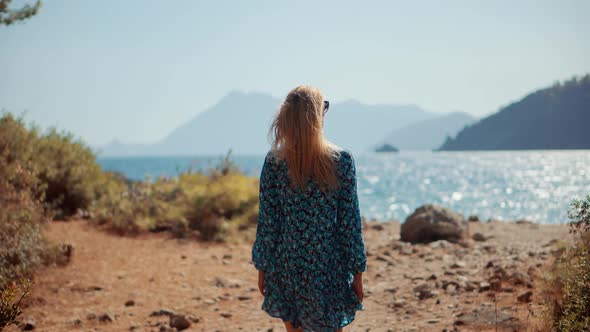 Tourist On Greek Island. Woman Harmony Mediterranean Sea Beach. Cinematic Inspiration Travel Holiday