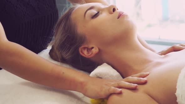 Woman Gets Shoulder Massage Spa By Therapist