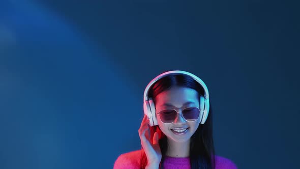 Music Chill Neon Light Girl Dancing in Headphones