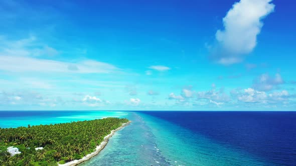 Aerial above sky of paradise shore beach vacation by blue water and bright sand background of journe