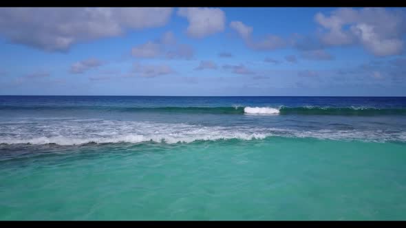 Aerial view scenery of paradise coast beach lifestyle by blue sea with white sand background of jour