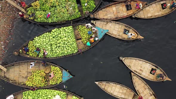 Aerial view of people working on commercial boats, Buriganga, Dhaka, Bangladesh.