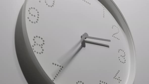 Dotted White Clock Face on Wall All Day