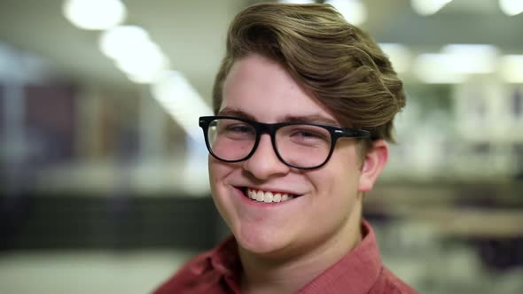 Teenage boy looking at camera and smiling