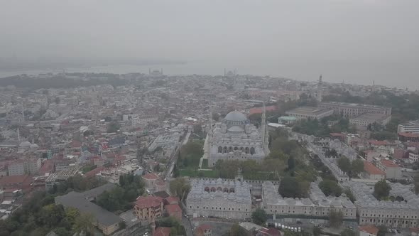 Aerial footage of Suleymaniye Mosque from a foggy day