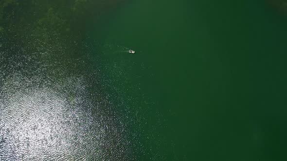 Descending view of a boat on Lyman Lake