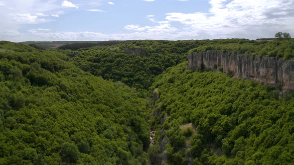 Drone flight over a picturesque river canyon