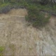 Aerial shot revealing landscape above beach cliff - VideoHive Item for Sale