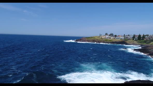 Aerial footage of Keleula Head near Kiama in regional New South Wales in Australia