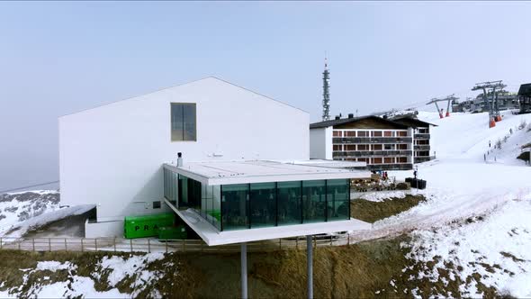 Alpine Restaurant and Museum on Snow Covered Mountain