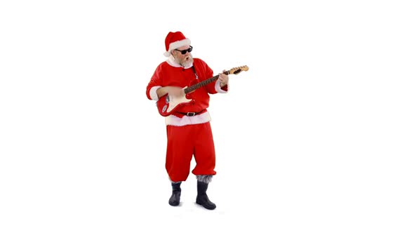 Santa claus singing a song and playing guitar