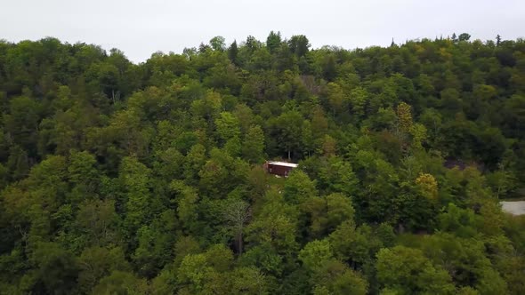 Drone Flying Above Green Hilltops