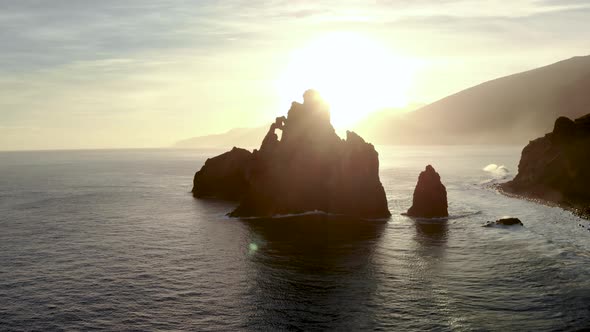 Aerial Panning Shot of Massive Sea Stack Near Ribeira Da Janela, Madeira Island Portugal