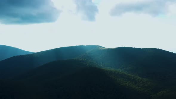 An aerial shot (dolly in) of Cole Mountain and the Appalachian Trail during a summer afternoon. Loca