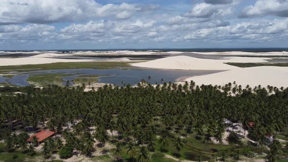 Sand dunes mountains and rain water lagoons at northeast brazilian paradise.