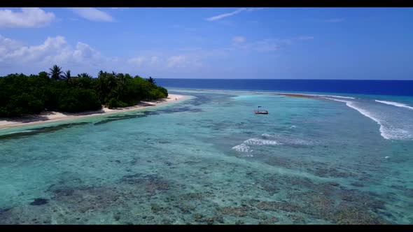 Aerial above seascape of exotic tourist beach time by blue ocean with white sand background of a day