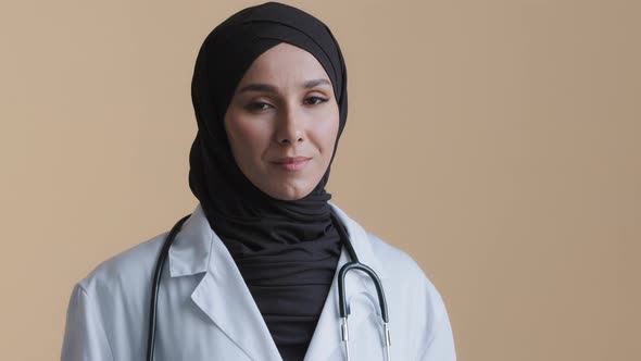 Portrait Happy Smiling Muslim Arab Woman Islamic Doctor Physician in Hijab Wear White Medical Coat