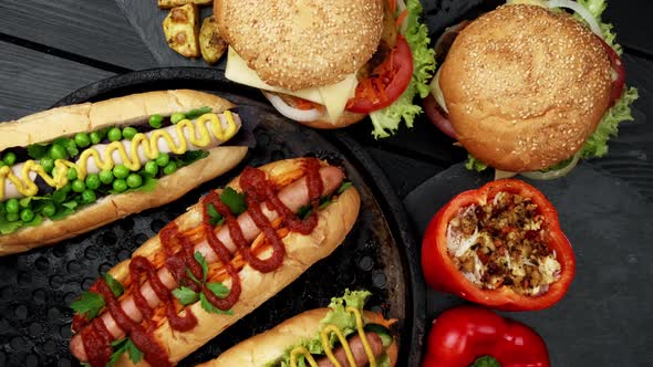 Vegeterian Hot Dogs Served with Tomatoes Avacado Onion and Buns Over Wooden Background