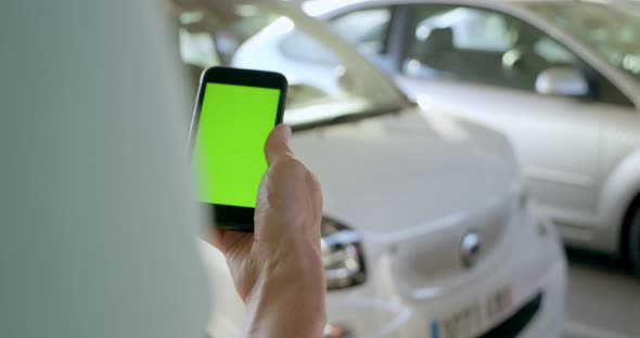 Man Opens Rental Electric Sharing Car with Phone